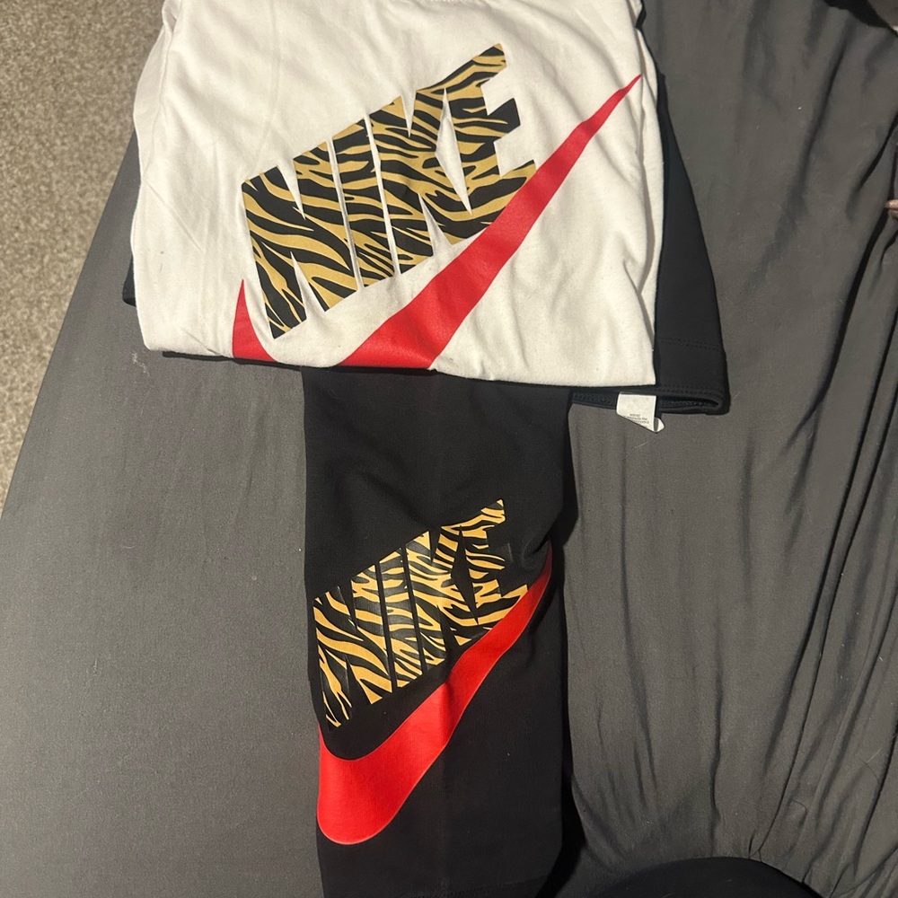 Nike White and Black Tees with Red and Zebra Accents